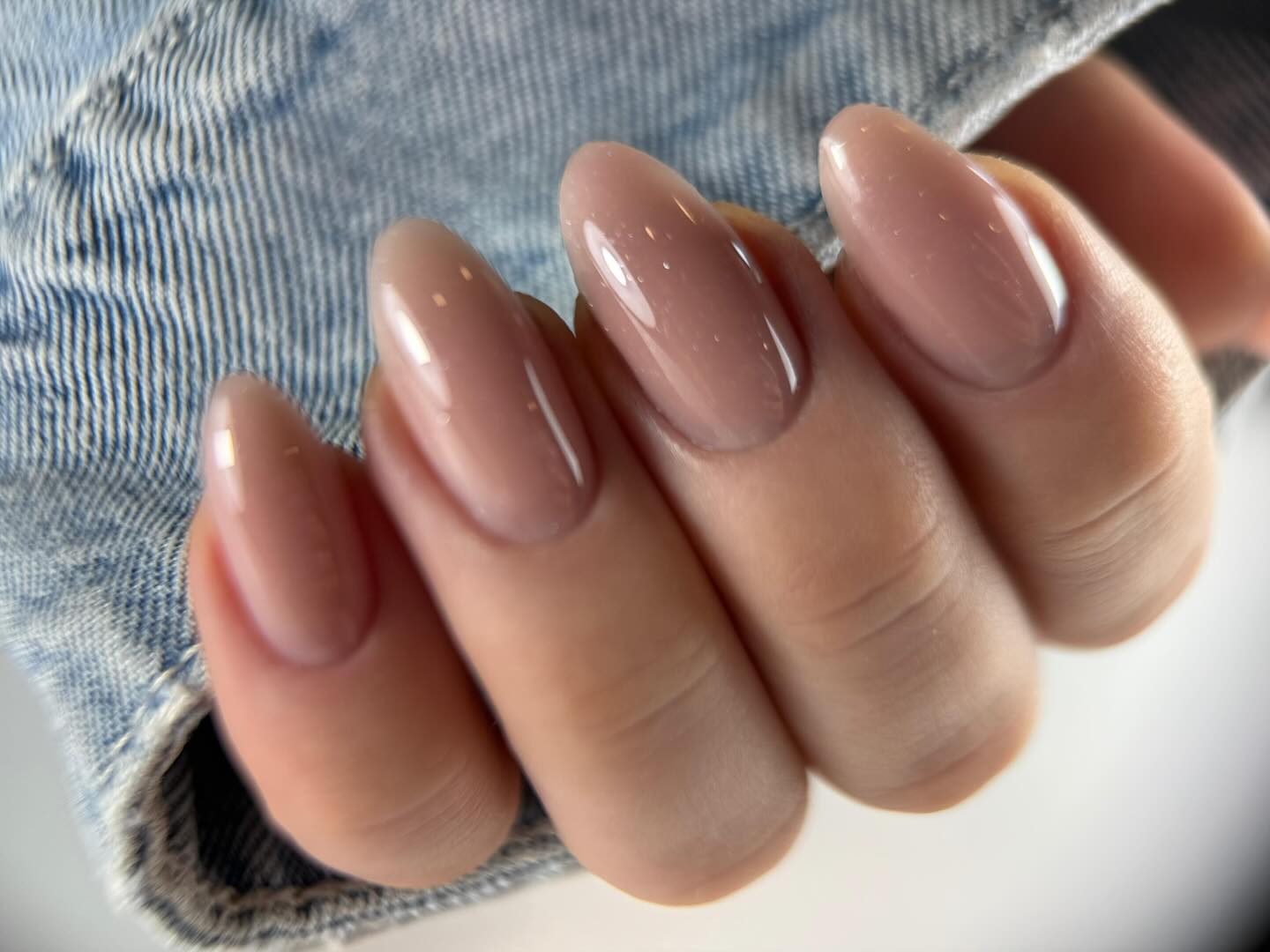 Graphic French manicure with negative space detailing.